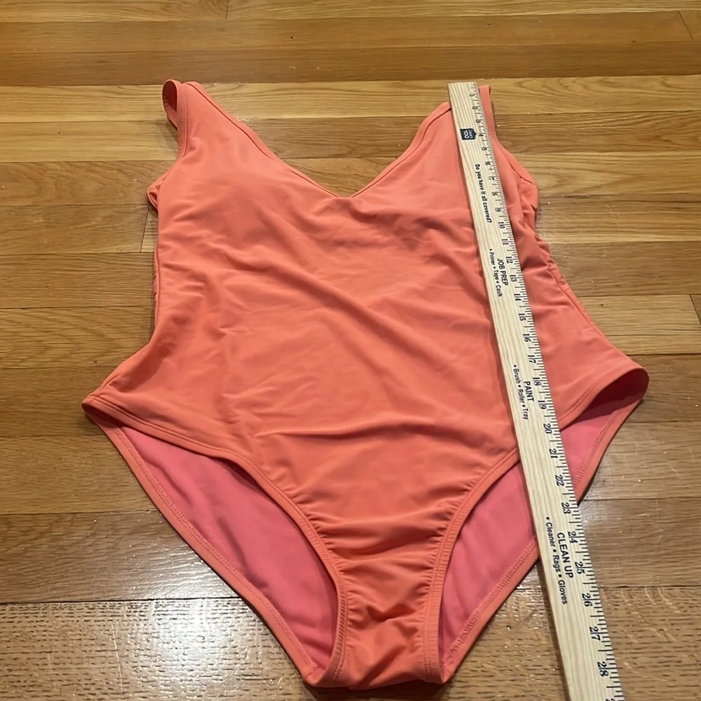Kona sol women’s peach color vneck one piece swimsuit size xlarge.
